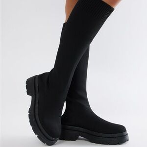 Fashion nova black knee high boots. Never worn, still in box. Size 7.5